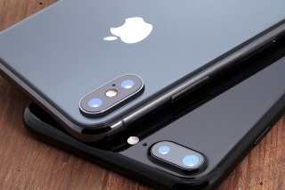 Koszalin, Poland – November 29, 2017: Space gray iPhone X and black iPhone 7. The iPhone X and iPhone 7 is smart phone with multi touch screen produced by Apple Computer, Inc.