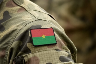 Flag of Burkina Faso on military uniform. Army, troops, soldiers, Africa, (collage).