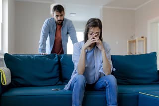 Angry Fury Man Screaming at Woman. Angry Couple Having an Argument in Their Living Room. Young Marriage Couple Have an Argument Because of Relationship Crisis. Couple Having Argument - Conflict, Bad Relationships.
