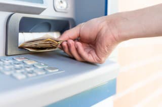 Withdraw cash from an ATM.