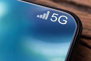 Closeups Photo Of Mobile Phone Connected To 5G Network