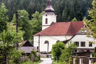 church in Stare Hory village in Slovakia with Velka Fatra mountains on the background