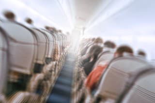 aerophobias concept. plane shakes during turbulence flying air hole. Blur image commercial plane moving fast downwards. Fear of flying. collapse slump, depression, downfall, debacle, subsidence, trip.