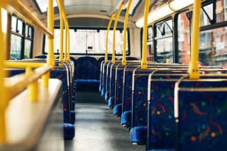 Cropped shot of empty seats on a public bus