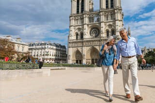 Senior couple in vacation, spending their holidays visiting the beautiful city of Paris, France.