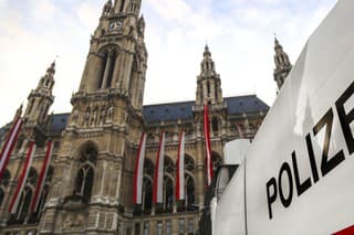 Polizei (Police) sign on a vehicle in front of Vienna Rathaus (City hall)