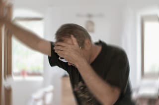 Man suffering from vertigo or dizziness or other health problem of brain or inner ear.