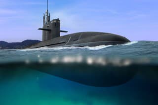 Naval submarine floating and half submerged in shallow water