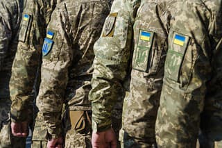 Ukrainian soldiers on military parade. Ukrainian flag on military uniform. Ukraine troops.