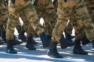 Soldiers in dress uniform marching in the parade