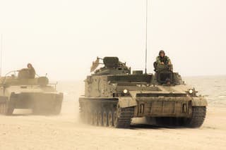 Russian tanks convoy on military maneuvers.