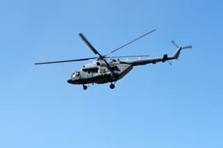 Mi-8 in flight on clear blue sky background