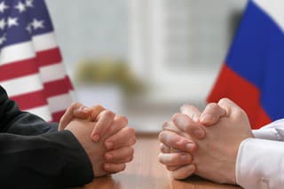 Negotiation of USA and Russia. Statesman or politicians with clasped hands.