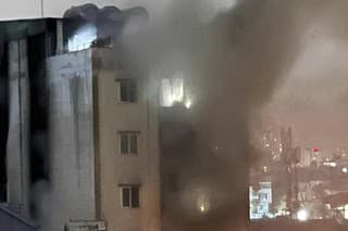 Počet obetí požiaru  bytového domu v Hanoji stúpol na 56