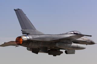 Close view of an F-16 Fighting Falcon Taking off with afterburner
