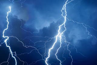 Summer storm bringing thunder, lightning and rain during night.