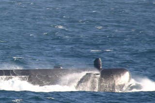 A Submarine out at sea (about 80 miles off shore)