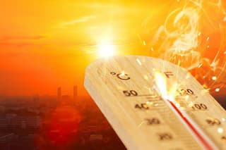 summer hot weather season high temperature thermometer with city view.