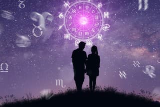 Astrological zodiac signs inside of horoscope circle. Couple singing and dancing over the zodiac wheel and milky way background. The power of the universe concept.