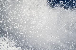 inside avalanche snow splashing spraying inside of snowslip snowslide snow masses