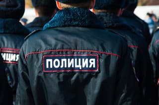 Russian police officers in uniform. Text in russian: "Police"