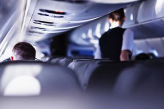 Airplane cabin during flight. Shallow DOF, selective focus. 