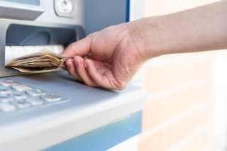 Withdraw cash from an ATM.