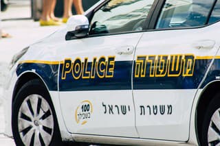 Tel Aviv Israel October 05, 2019 View of a Israeli police car parked front the beach in Tel Aviv in the afternoon