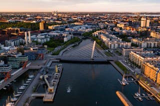 Aerial drone view of Ruoholahti area, summer, sunset in Helsinki city