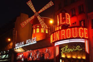 People Queue for a Night Show at The Moulin Rouge. Paris, France