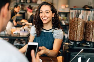 Client pays contactless at coffeeshop