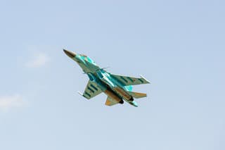 100th anniversary of Russian Air Force. Four-generation Russian multifunctional front-line supersonic fighter-bomber Su-34 (Fullback) performs a demonstration flight.Zhukovsky, Russia, August 10, 2012