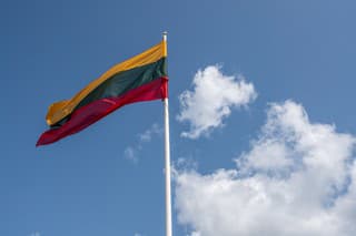 Lithuanian Flag on a blue sky with clouds - Lithuania