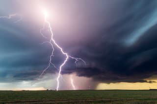Massive cloud to ground lightning strikes from a supercell thunderstorm near Sterling, Colorado.