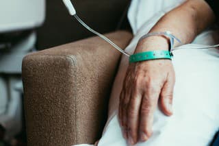 Old man patient hand in hospital