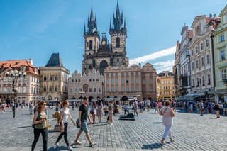 Prague, Czech Republic - July 2, 2016: Tourists visit Old Town Square, the heart of the Czech capital.
