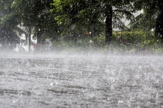 Torrential rain causing flood.