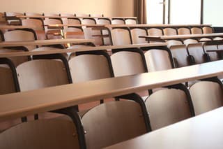 Shot of an empty university classroom after the cancellation of schools regarding covid 19