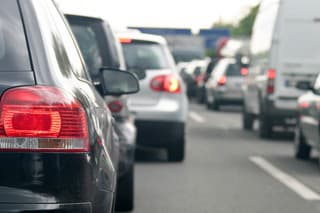 Traffic jam on a german highway with focus on the left back light.