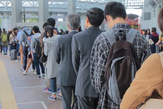 Kanazawa Japan - October 18, 2016: Unidentified people queue at Kanazawa station bus terminal.