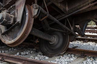 Abandoned railway station with damaged wagons