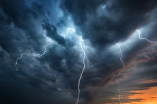 Lightning thunderstorm flash over the night sky. Concept on topic weather, cataclysms (hurricane, Typhoon, tornado)