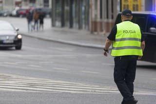 Sarajevo, Bosnia and Herzegovina - May 26 2019: Policeman doing the traffic to let pass an official convoy.