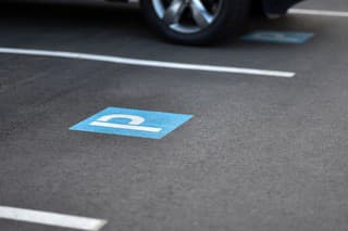 painted parking sign on the asphalt