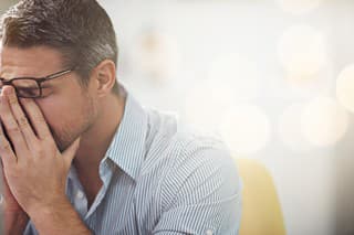 Cropped shot of a stressed businessman sitting at his deskhttp://195.154.178.81/DATA/i_collage/pi/shoots/783721.jpg