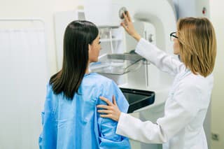 Young woman is having mammography examination at the hospital or private clinic with a professional female doctor.
