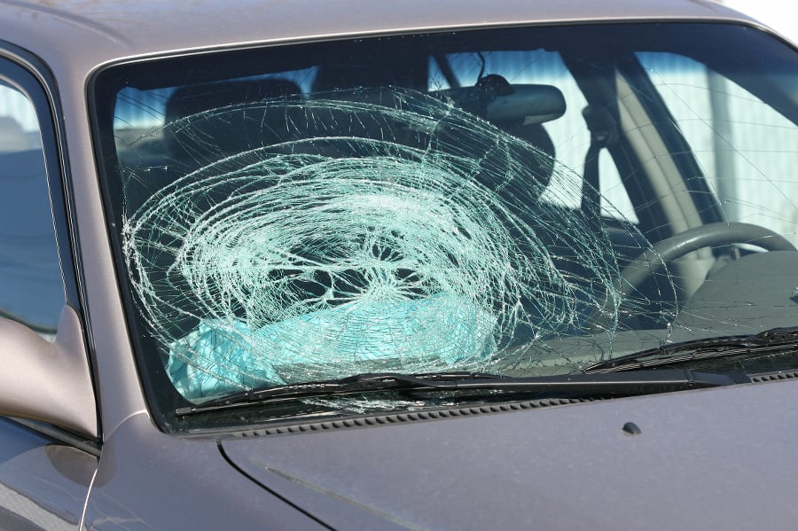 Broken windshield from airbag