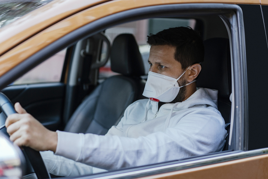 Man driving his car