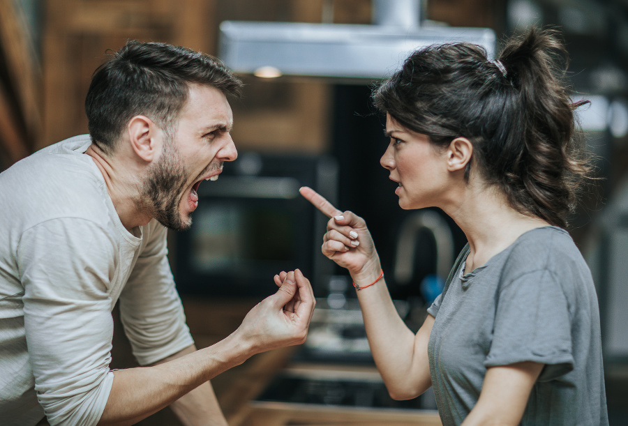 Aggressive couple arguing about