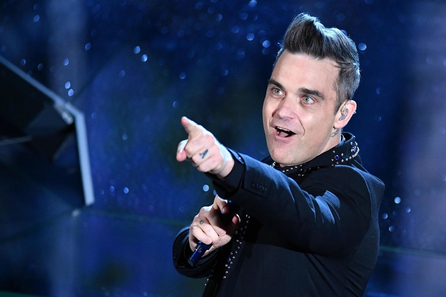 Spevák Robbie Williams.